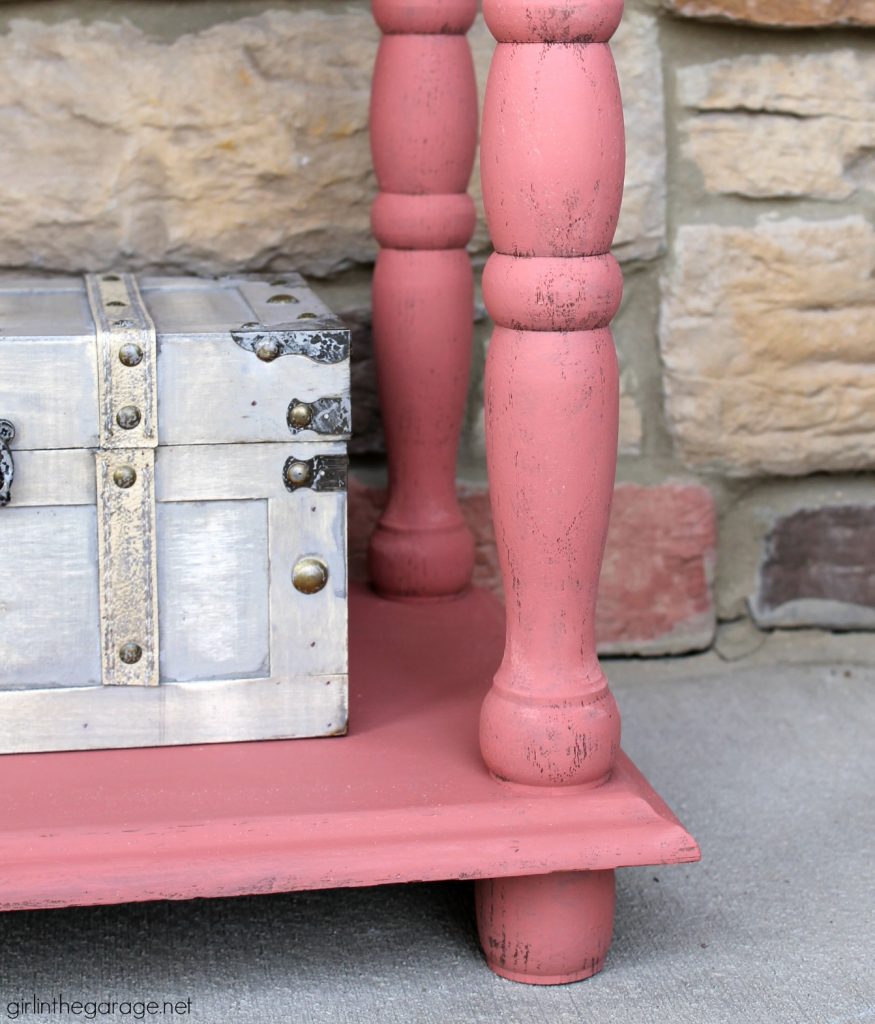 This updated telephone table was rescued from the thrift store and painted pink Chalk Paint. Now it's happy and living its best life. By Girl in the Garage