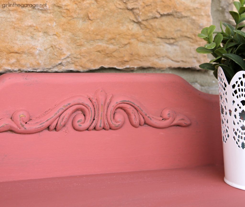 This updated telephone table was rescued from the thrift store and painted pink Chalk Paint. Now it's happy and living its best life. By Girl in the Garage