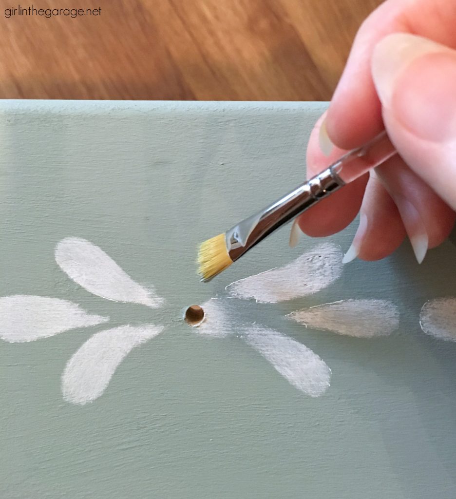 Ethan Allen nightstand makeover to charming stenciled table. DIY furniture makeover tutorial by Girl in the Garage.