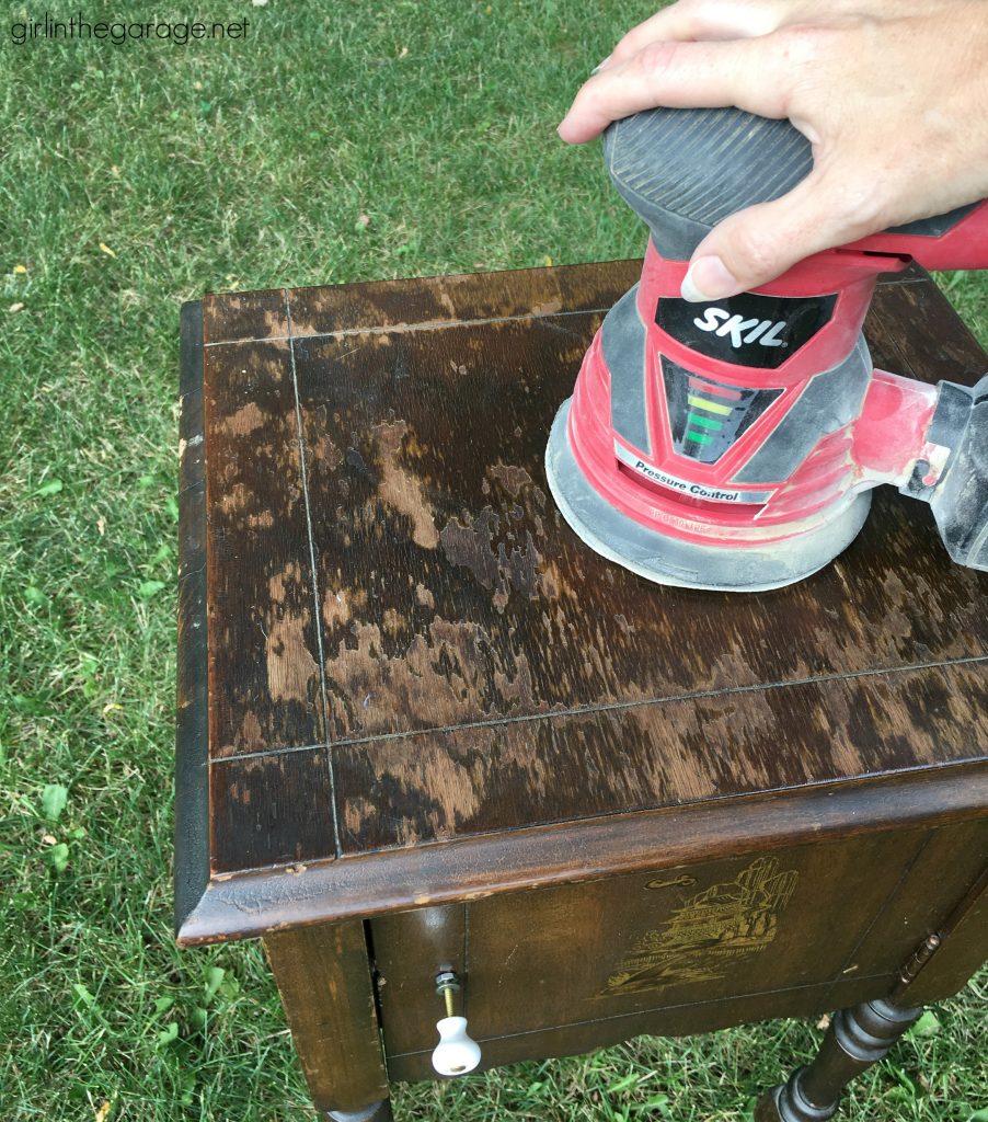 Add amazing custom texture with a raised stencil furniture makeover using spackling from the hardware store. Step by step DIY tutorial for embossed furniture by Girl in the Garage.