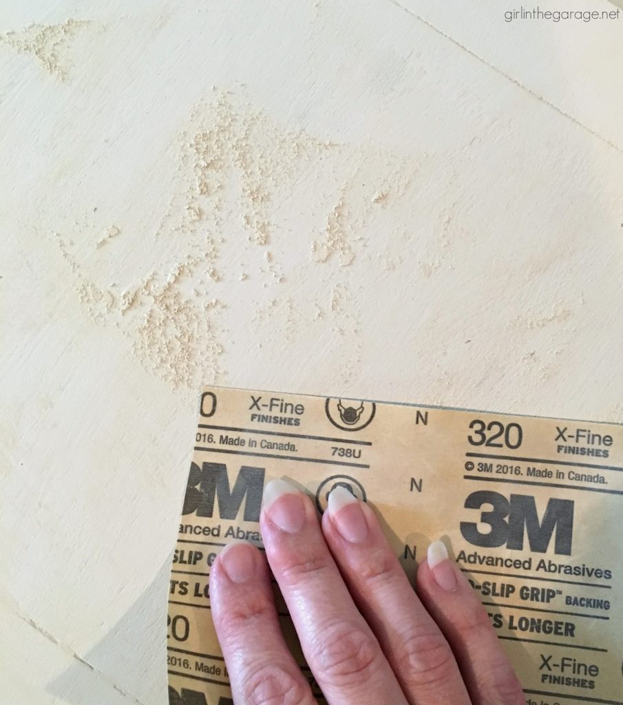 Sanding furniture with 320 grit sandpaper. Girl in the Garage