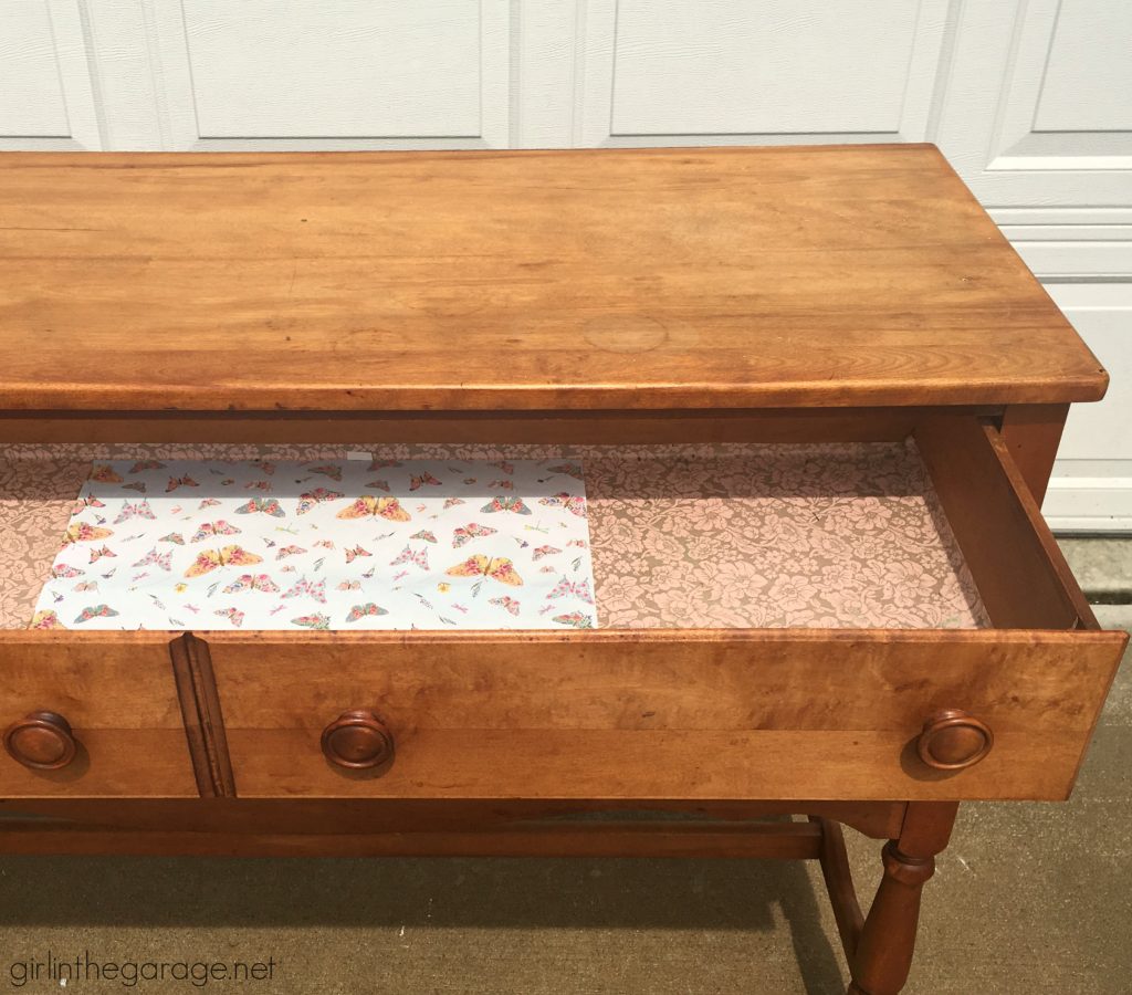 Do your drawers have old contact paper stuck inside? Discover how to remove contact paper the easy way. DIY painted furniture ideas by Girl in the Garage