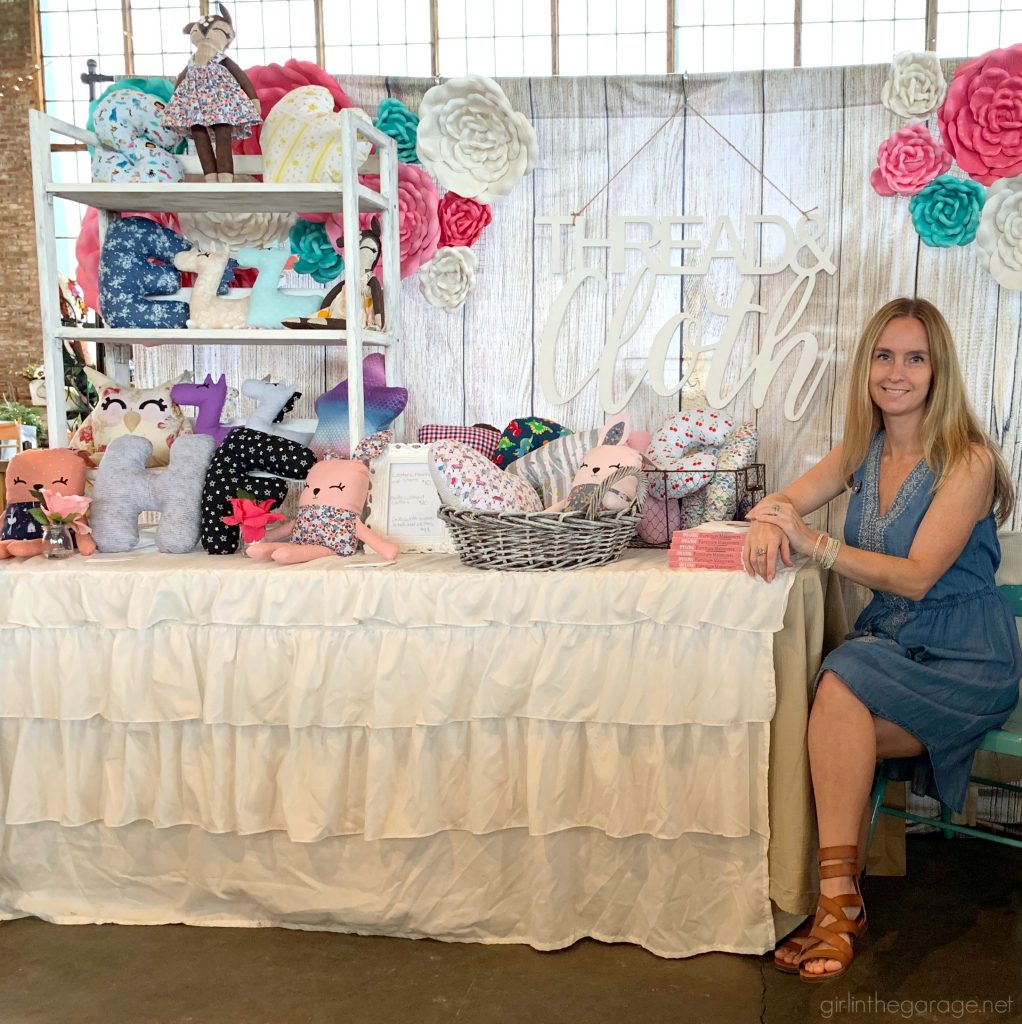 Craft fair necessity: A DIY painted folding bookcase - portable and sets up in seconds. Paint a folding bookcase to match your market booth's style. by Girl in the Garage