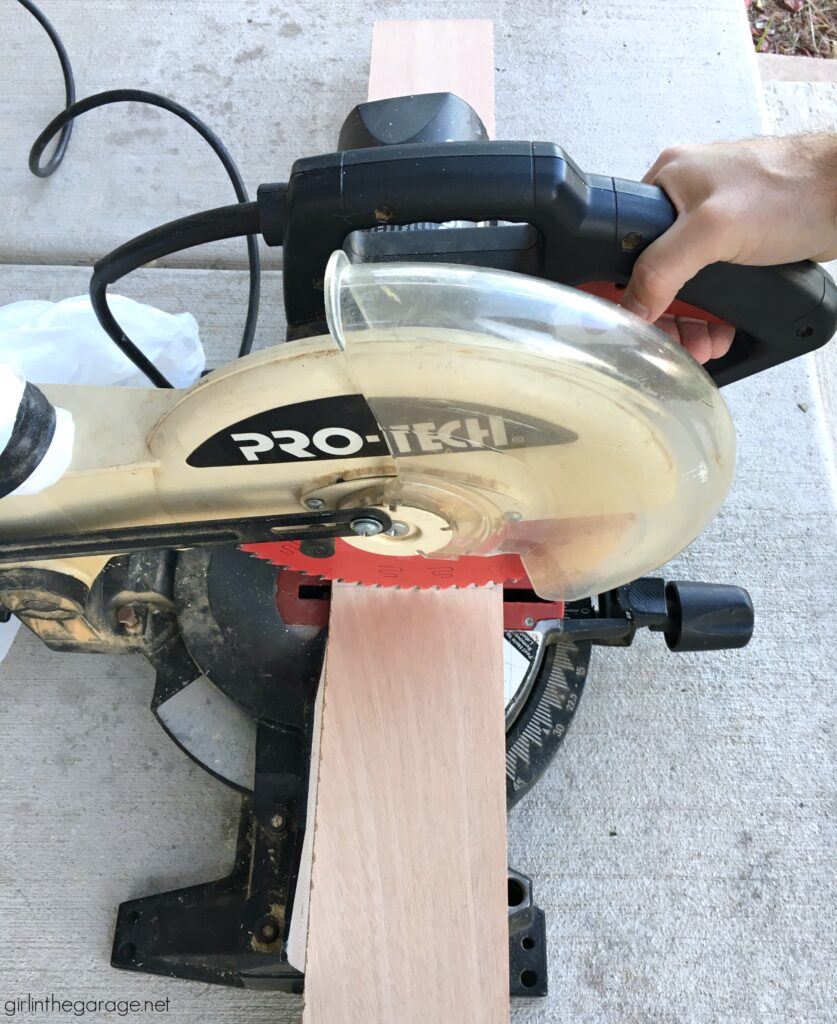 Learn how to easily whitewash wood planks for a gorgeous updated furniture makeover. DIY furniture makeover tutorial by Girl in the Garage.