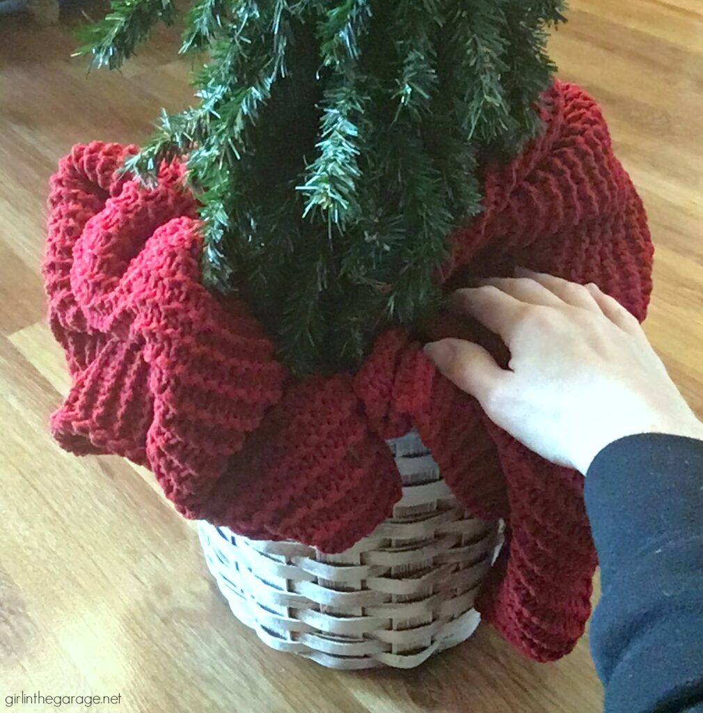 For cozy Christmas decor, learn how to use a thrifted basket as a DIY Christmas tree basket stand. An easy project with beautiful results. DIY furniture makeover and decor ideas by Girl in the Garage