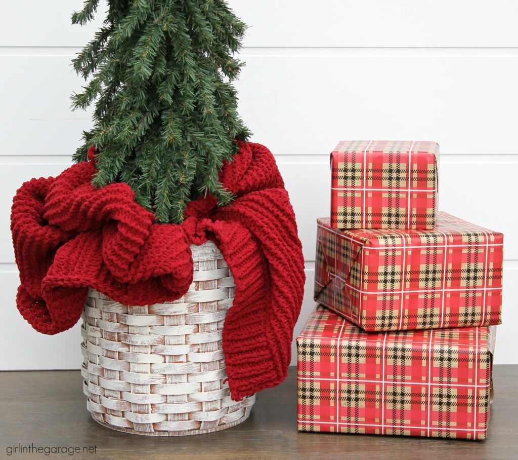 For cozy Christmas decor, learn how to use a thrifted basket as a DIY Christmas tree basket stand. An easy project with beautiful results. DIY furniture makeover and decor ideas by Girl in the Garage