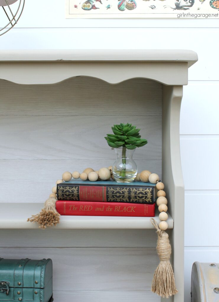 Learn how to easily whitewash wood planks for a gorgeous updated furniture makeover. DIY furniture makeover tutorial by Girl in the Garage.