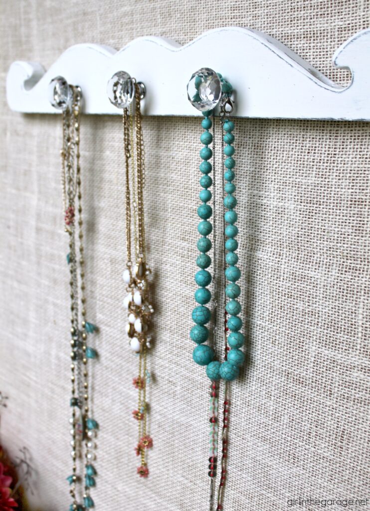 How to create an easy, stunning DIY necklace display with salvaged wood to organize your treasured jewelry. By Girl in the Garage