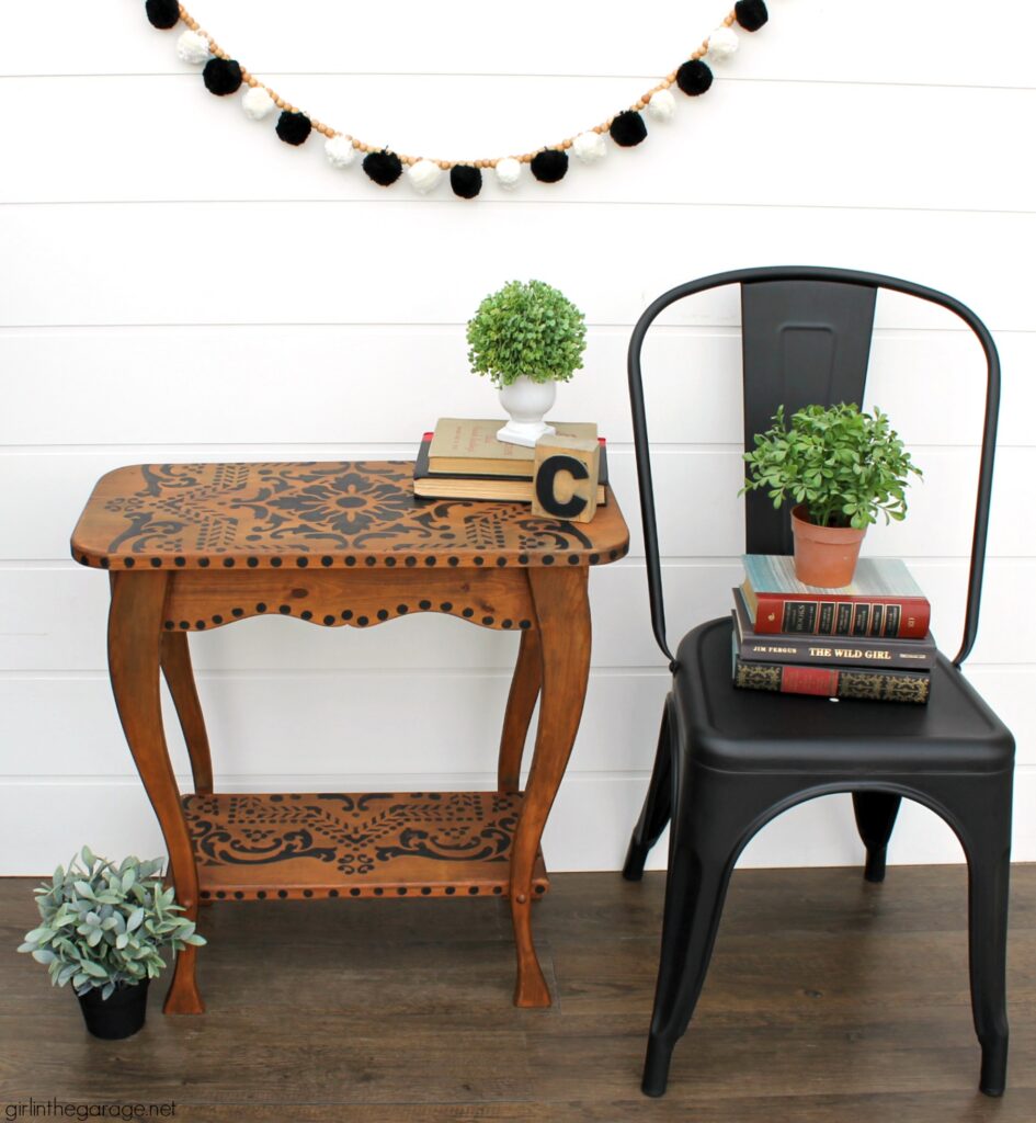 Love the black wood stain look? Learn how to stencil a table and easily stain wood black with furniture wax. By Girl in the Garage