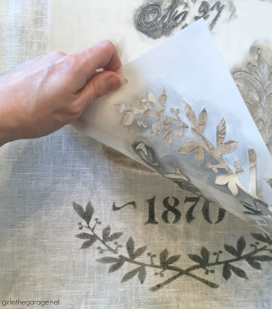 Make custom DIY home decor - learn how to stencil pillows on IKEA products. Gorgeous vintage inspired French throw pillows by Girl in the Garage.