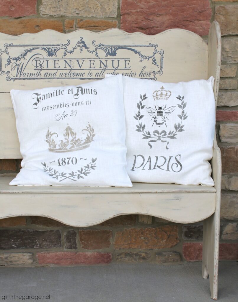 Make custom DIY home decor - learn how to stencil pillows as an IKEA hack. Gorgeous vintage inspired French throw pillows by Girl in the Garage.