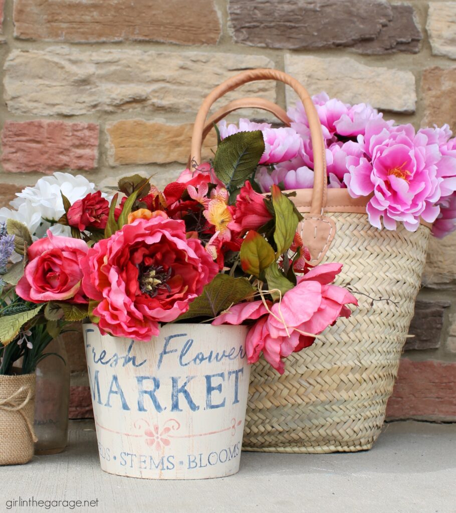 Create a gorgeous home for your flowers with this stenciled wooden flower bucket project. It's easy and beautiful decor. DIY home decor ideas by Girl in the Garage