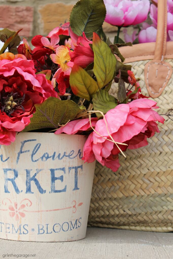 Create a gorgeous home for your flowers with this stenciled wooden flower bucket project. It's easy and beautiful decor. DIY home decor ideas by Girl in the Garage