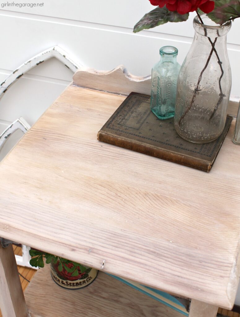 Learn easy steps to whitewash with Chalk Paint and how to remove paint from wood furniture with this stunning table makeover tutorial by Girl in the Garage