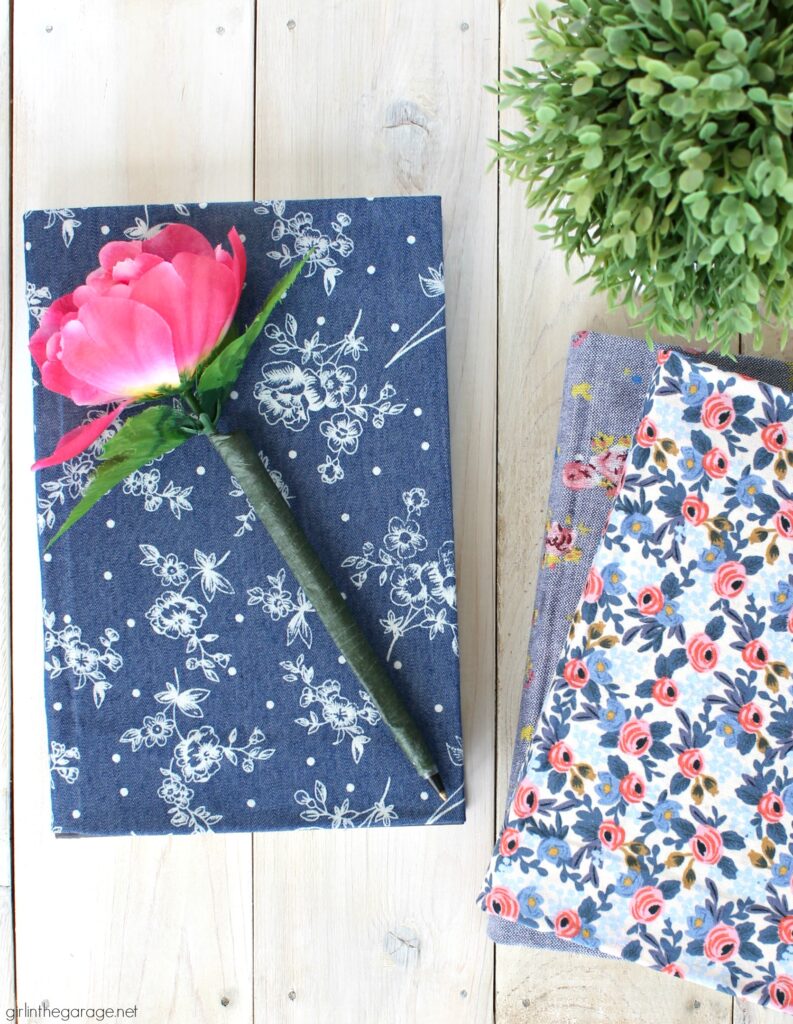 Learn how to decoupage fabric onto books and create gorgeous budget-friendly DIY home decor with this step by step tutorial from Girl in the Garage.