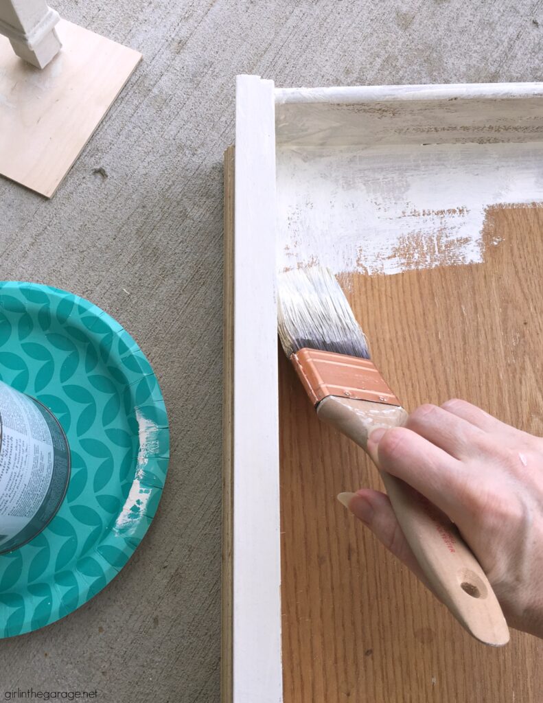 Learn how to make a DIY wood mosaic table top for a stunning furniture makeover. Creative painted furniture ideas by Girl in the Garage