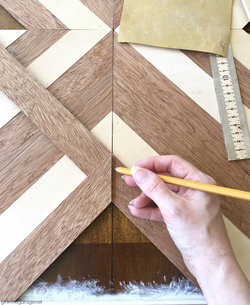 Learn how to make a DIY wood mosaic table top for a stunning furniture makeover. Creative painted furniture ideas by Girl in the Garage