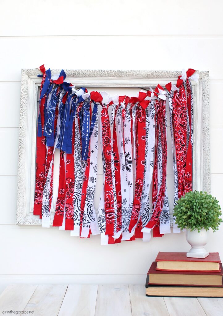 Make this festive DIY rag flag with bandanas for your 4th of July decor. Celebrate the summer with amazing DIY patriotic home decor ideas. By Girl in the Garage