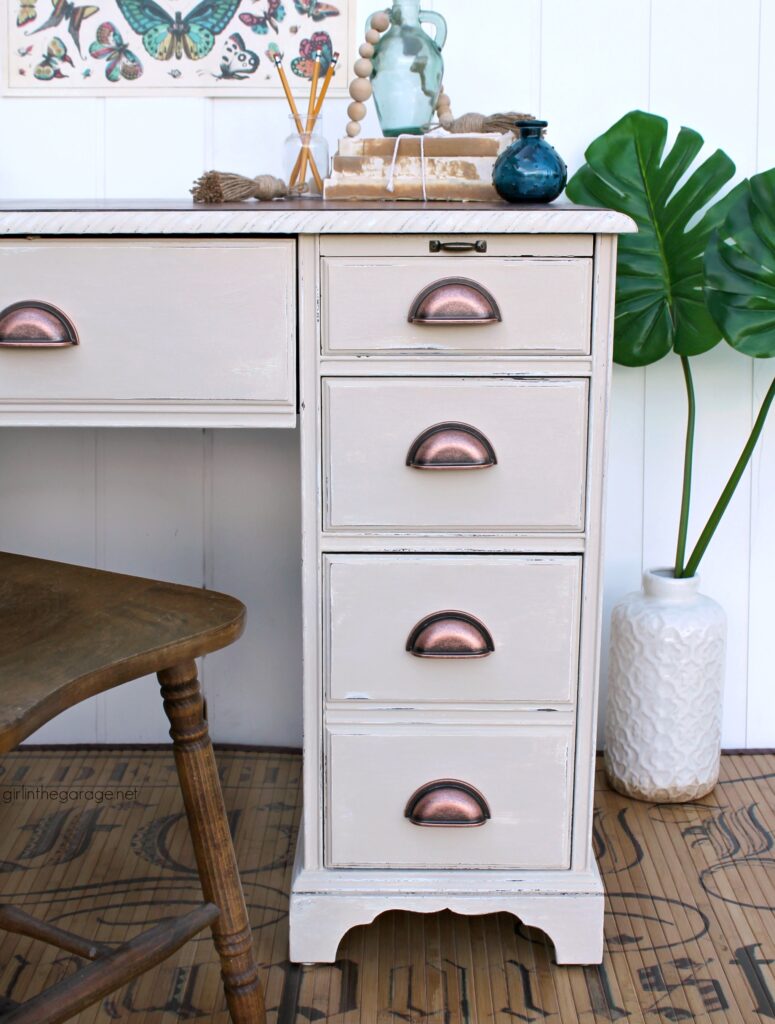 Transform a boring desk with Chalk Paint and new hardware. Learn how to Chalk Paint a wood desk. DIY painted furniture ideas by Girl in the Garage