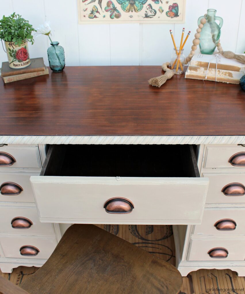 Transform a boring desk with Chalk Paint and new hardware. Learn how to Chalk Paint a wood desk. DIY painted furniture ideas by Girl in the Garage