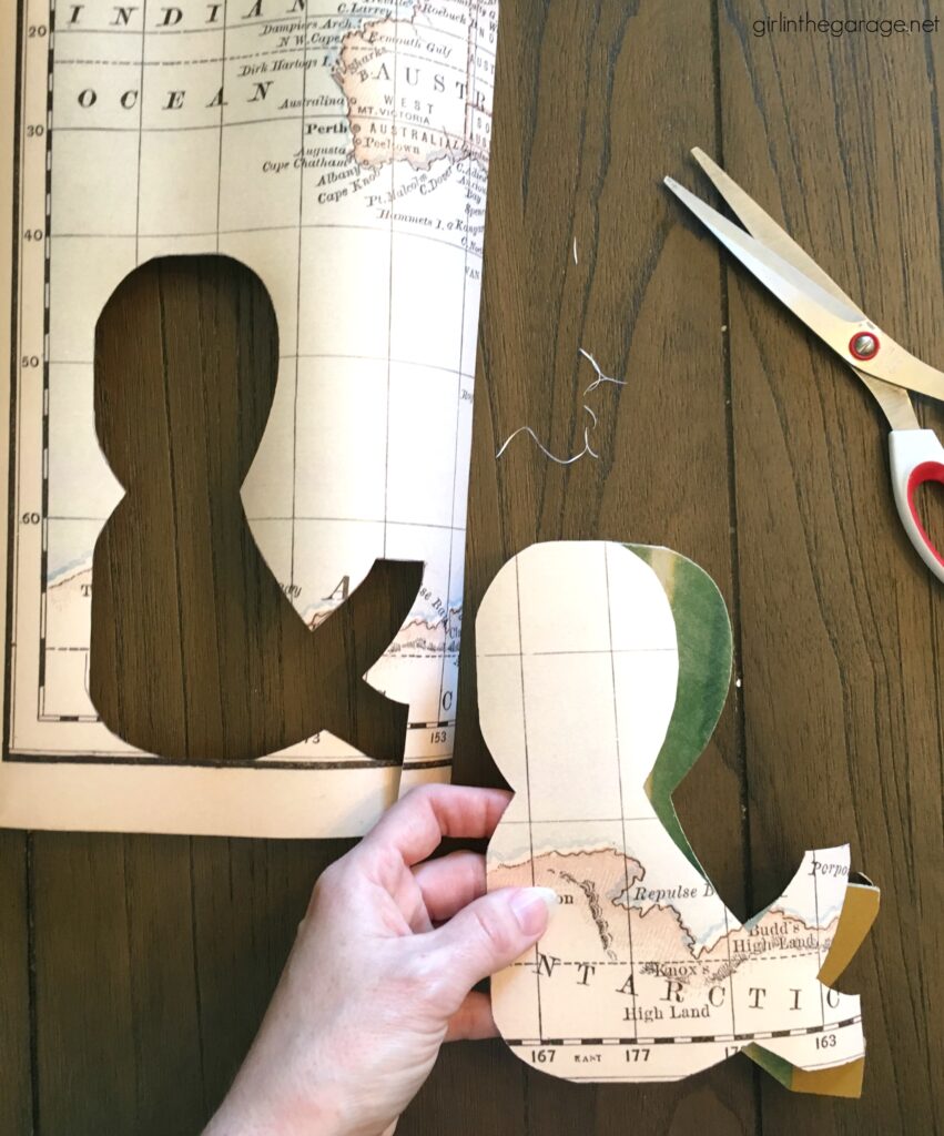 How to Decoupage Wooden Letters. Save money with these clever thrifted home decor ideas by Girl in the Garage