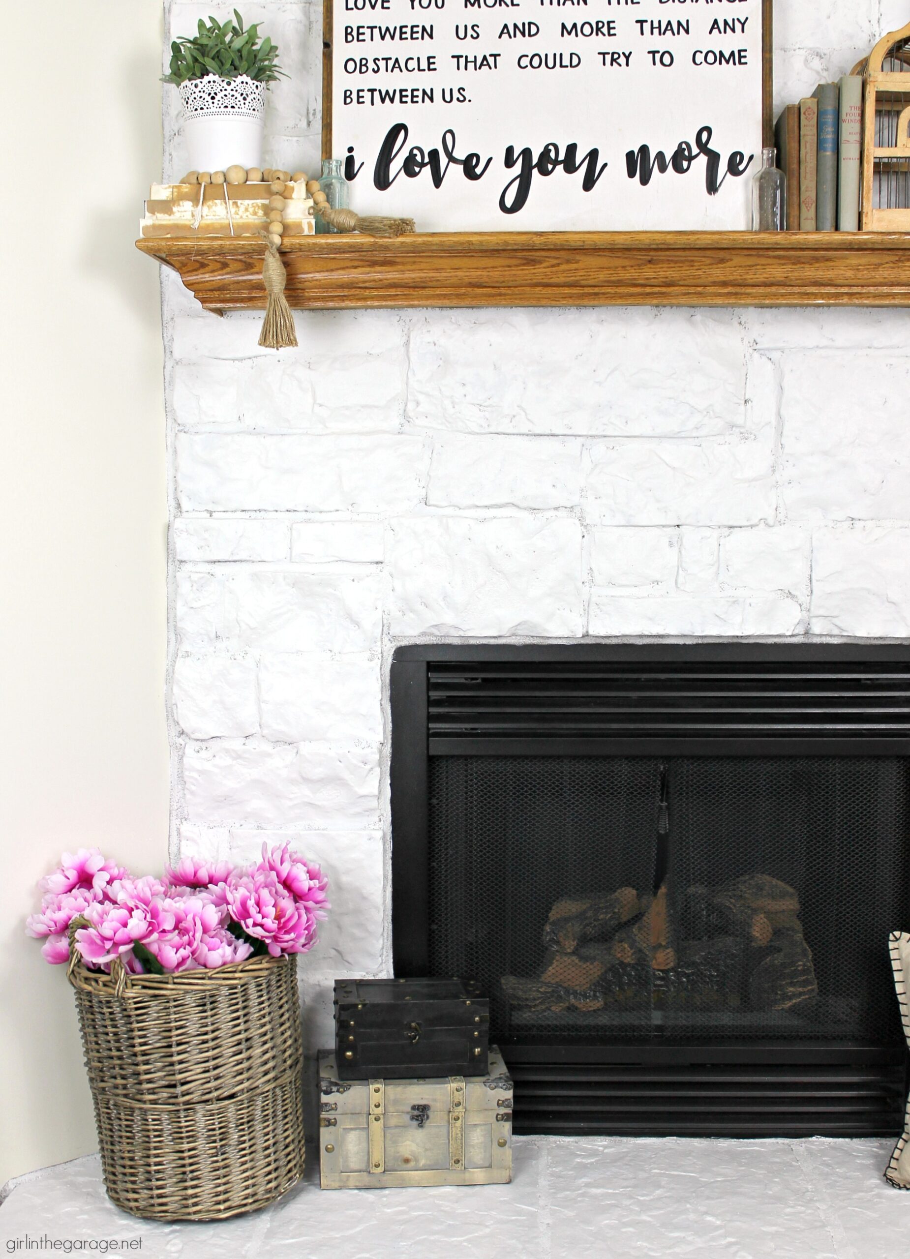 How to easily paint a stone fireplace white with helpful Purdy products meant for rough surfaces. #ad DIY makeover ideas by Girl in the Garage