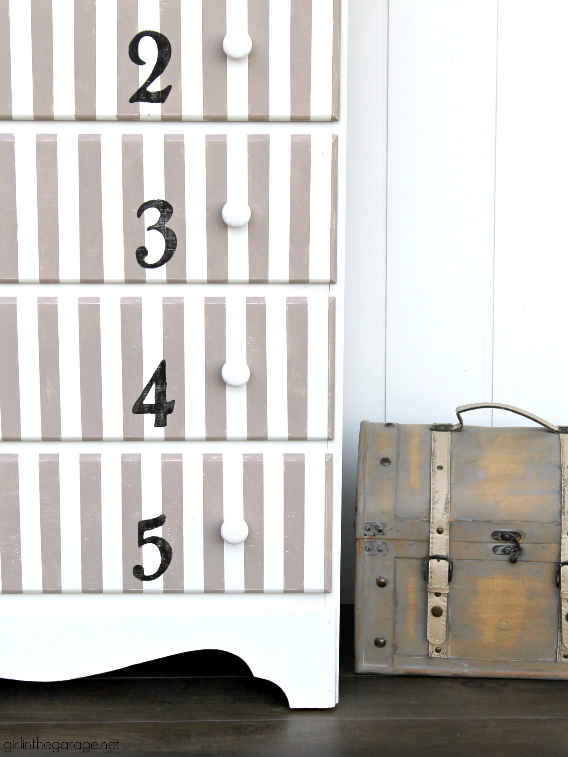 Give old furniture lots of charm with painted stripes and numbers. Learn how to easily paint stripes on a dresser with tape and a high quality Purdy paint brush. #ad DIY painted furniture ideas by Girl in the Garage