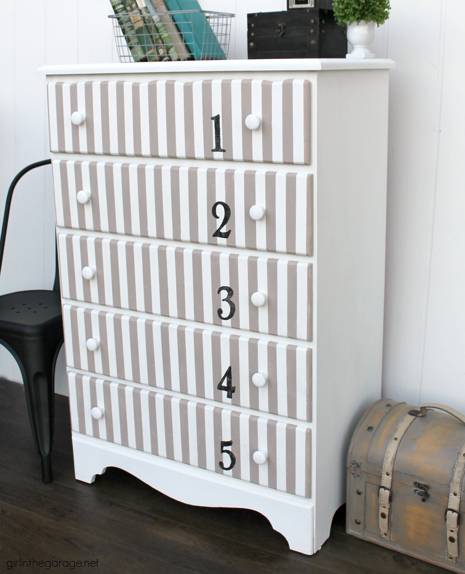 Give old furniture lots of charm with painted stripes and numbers. Learn how to easily paint stripes on a dresser with tape and a high quality Purdy paint brush. #ad DIY painted furniture ideas by Girl in the Garage