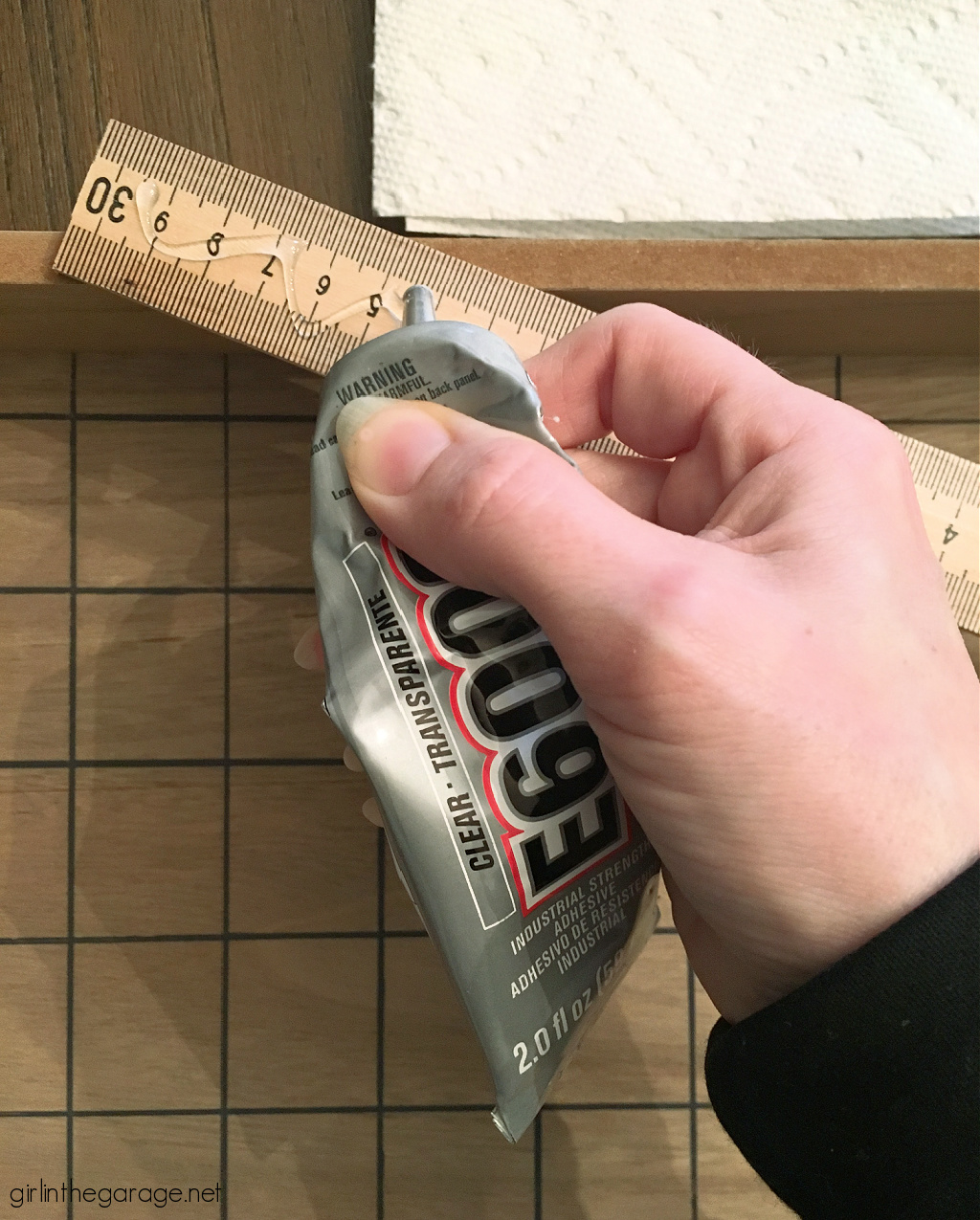 How to make an adorable upcycled wood tray with yardsticks and paint stirrers. Easy DIY home decor idea by Girl in the Garage