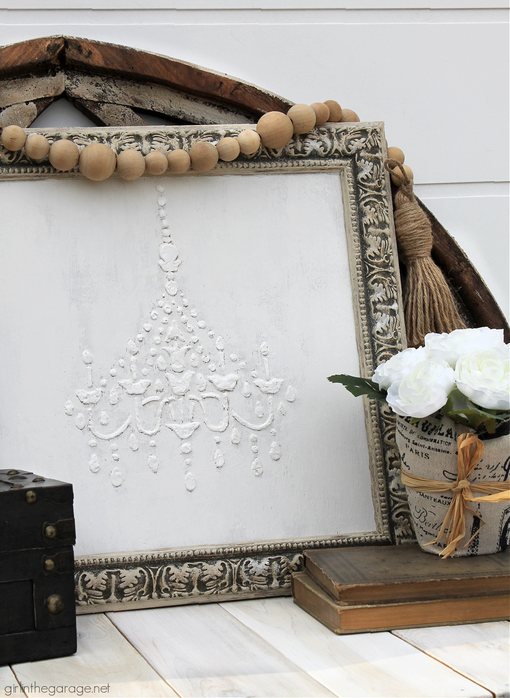 Learn how to make custom 3D chandelier wall art with a raised stencil technique and Chalk Paint. Beautiful French vintage decor by Girl in the Garage