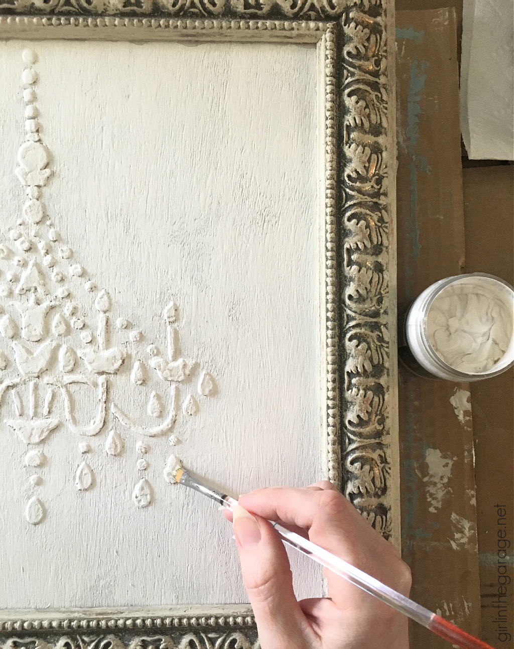 Learn how to make custom 3D chandelier wall art with a raised stencil technique and Chalk Paint. Beautiful French vintage decor by Girl in the Garage