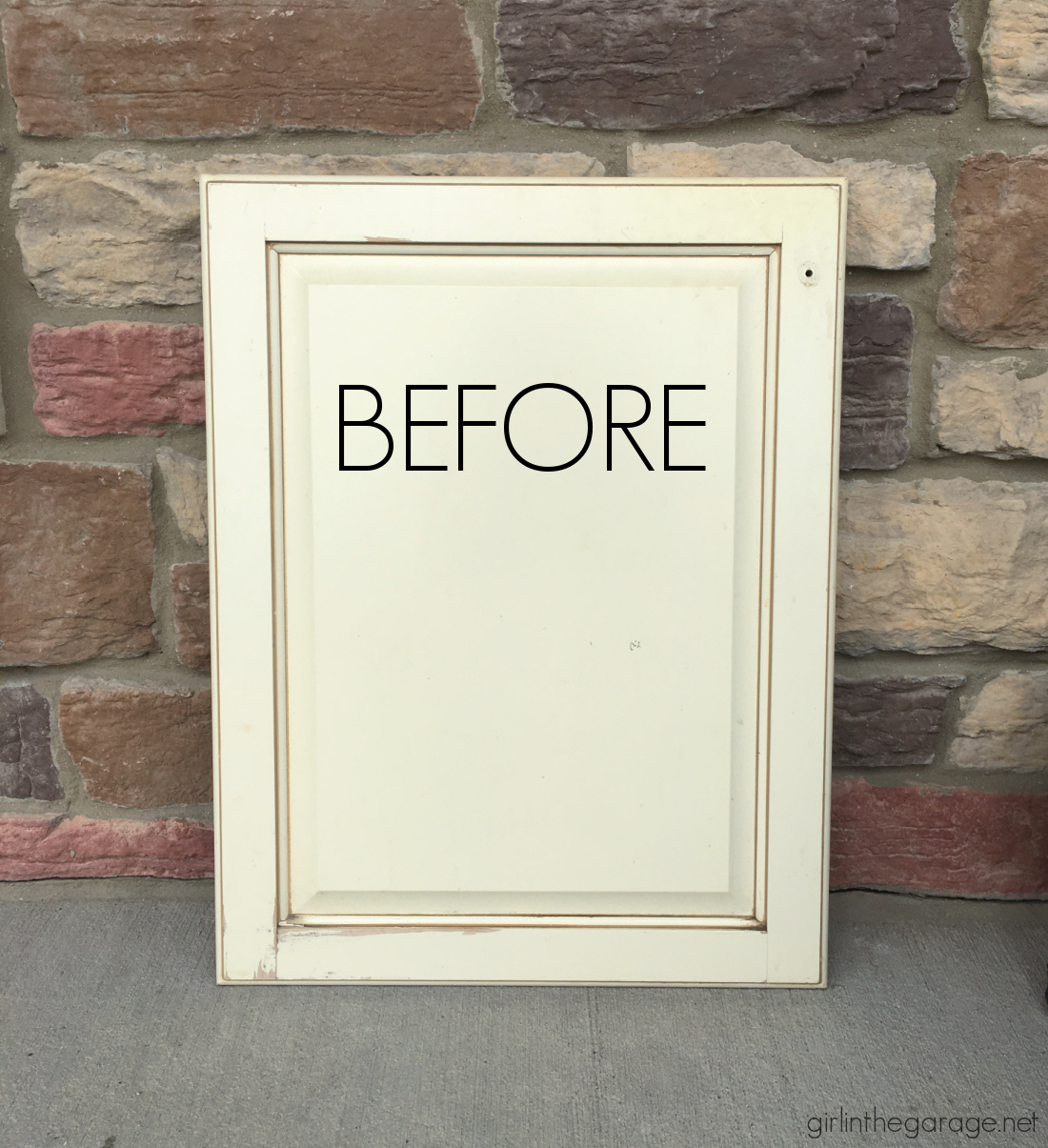 Learn how to repurpose an old cabinet door into an adorable DIY laundry room sign with grain sack stripes! By Girl in the Garage