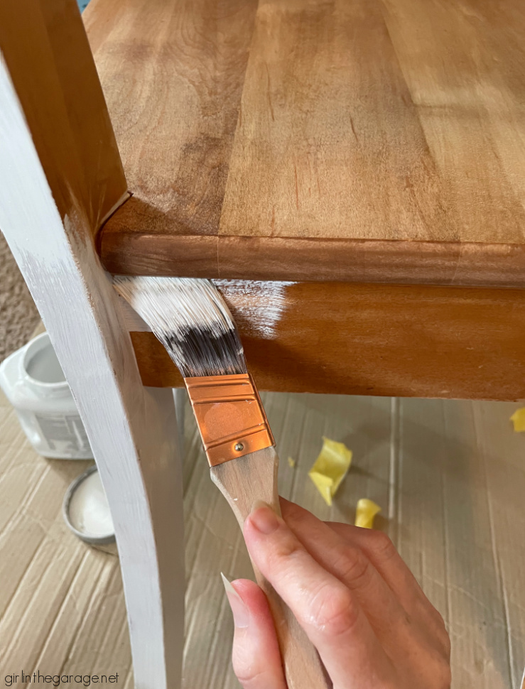 Learn how to stain and paint a wood chair for beautiful results. Step by step DIY tutorial by Girl in the Garage.