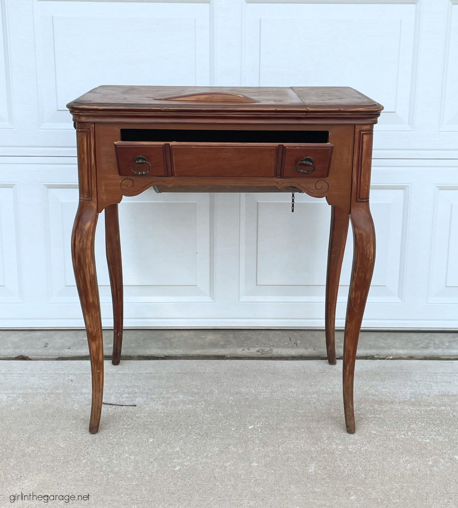 How to repurpose a sewing machine table into a stylish hall table or desk with new stained wood top and elegant Chalk Painted finish. By Girl in the Garage