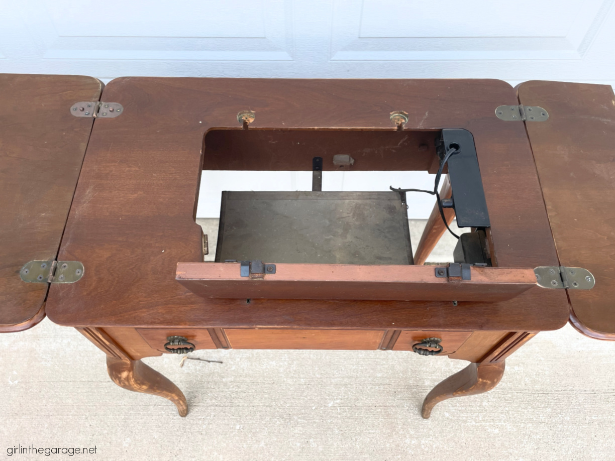 How to repurpose a sewing machine table into a stylish hall table or desk with new stained wood top and elegant Chalk Painted finish. By Girl in the Garage