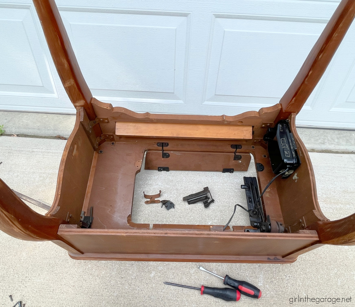 How to repurpose a sewing machine table into a stylish hall table or desk with new stained wood top and elegant Chalk Painted finish. By Girl in the Garage