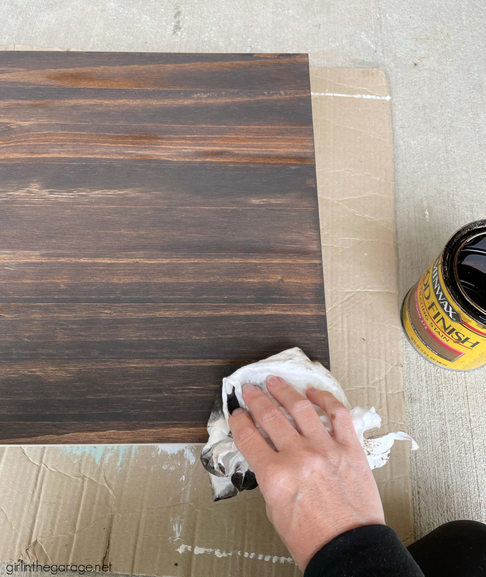 How to repurpose a sewing machine table into a stylish hall table or desk with new stained wood top and elegant Chalk Painted finish. By Girl in the Garage