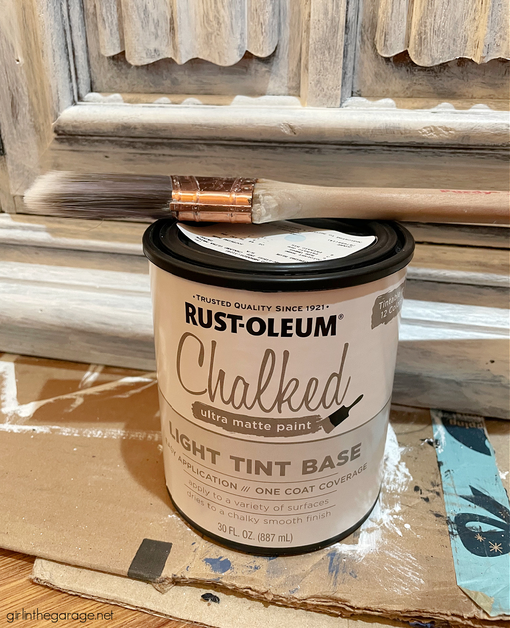 How to paint a vintage wood cabinet with Rustoleum Chalked Paint in Soothing Blue. Step by step painted furniture tutorial by Girl in the Garage.