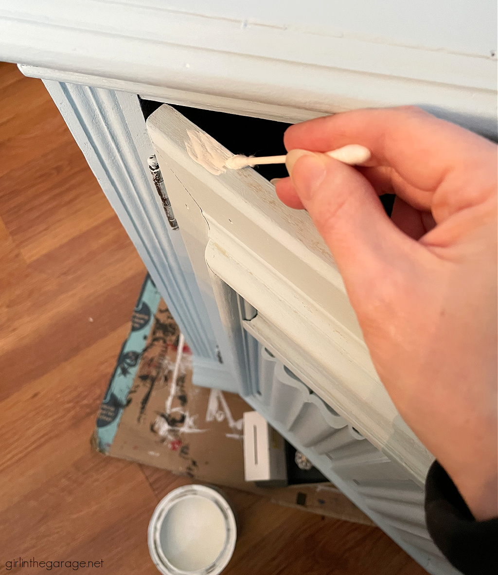 How to paint a vintage wood cabinet with Rustoleum Chalked Paint in Soothing Blue. Step by step painted furniture tutorial by Girl in the Garage.