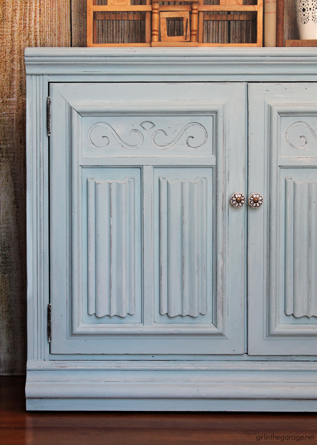 How to paint a vintage wood cabinet with Rustoleum Chalked Paint in Soothing Blue. Step by step painted furniture tutorial by Girl in the Garage.