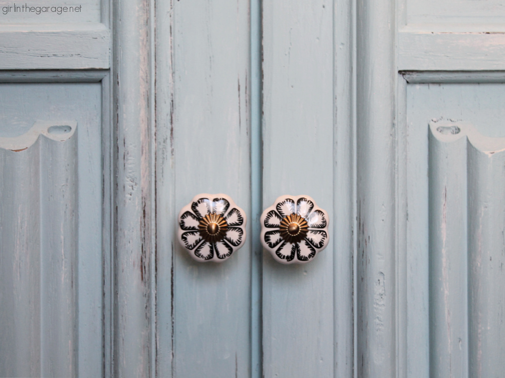 How to paint a vintage wood cabinet with Rustoleum Chalked Paint in Soothing Blue. Step by step painted furniture tutorial by Girl in the Garage.