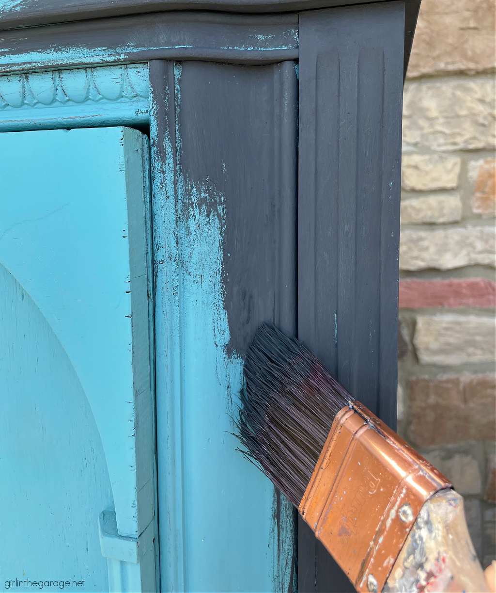 Repainted repurposed radio cabinet in Rustoleum Chalked Paint Charcoal with black wax. Industrial chic new look by Girl in the Garage