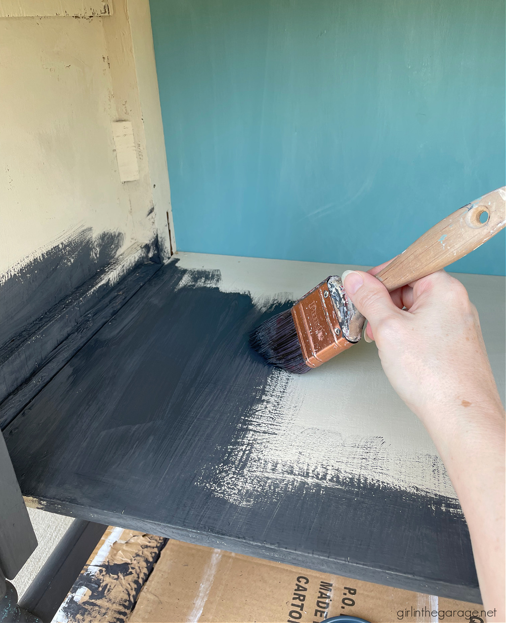 Repainted repurposed radio cabinet in Rustoleum Chalked Paint Charcoal with black wax. Industrial chic new look by Girl in the Garage