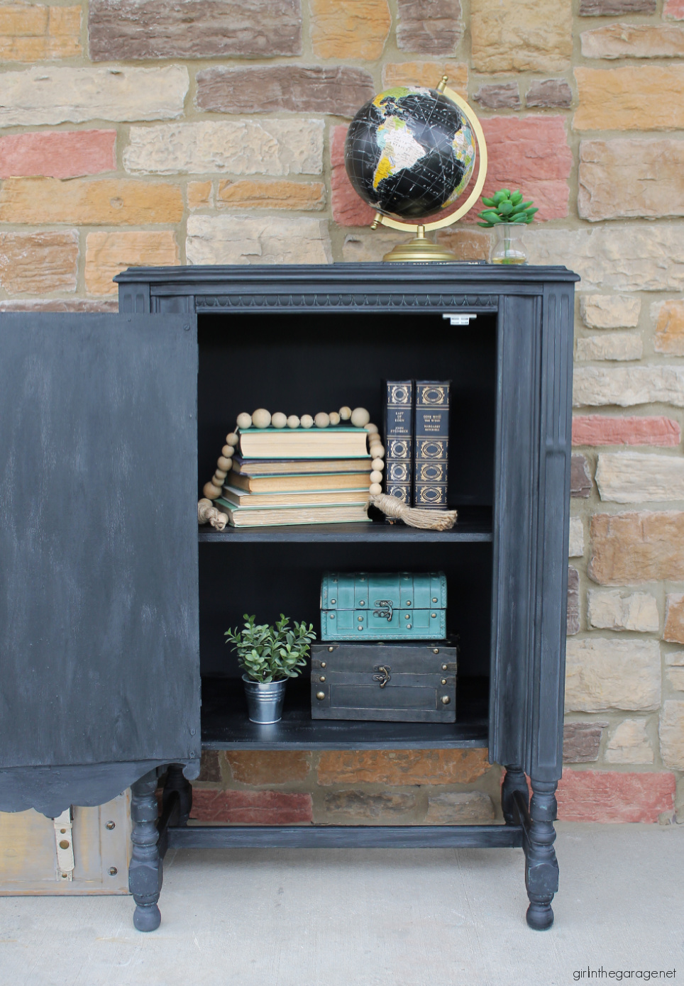 Repainted repurposed radio cabinet in Rustoleum Chalked Paint Charcoal with black wax. Industrial chic new look by Girl in the Garage