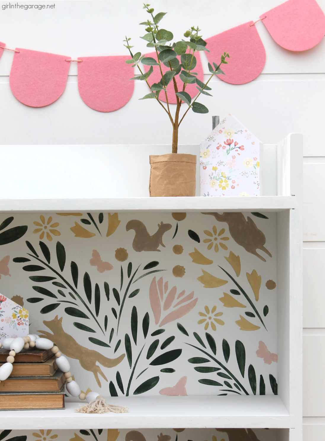 How to paint a bookcase white and add a whimsical stencil in multiple Country Chic Paint colors for a fun and unique furniture idea. By Girl in the Garage