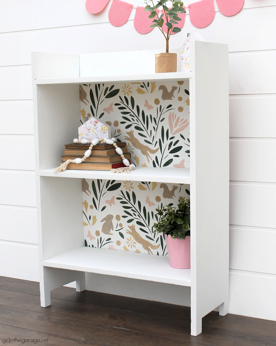 How to paint a bookcase white and add a whimsical stencil in multiple Country Chic Paint colors for a fun and unique furniture idea. By Girl in the Garage