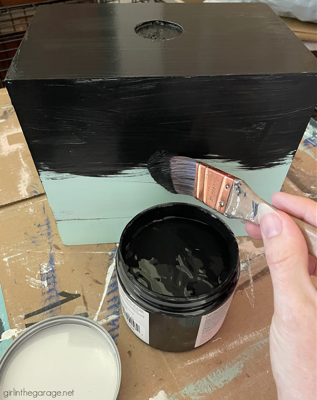 Learn how to stencil on wood decor and furniture. How to stencil bone inlay on a thrifted wood box. By Girl in the Garage