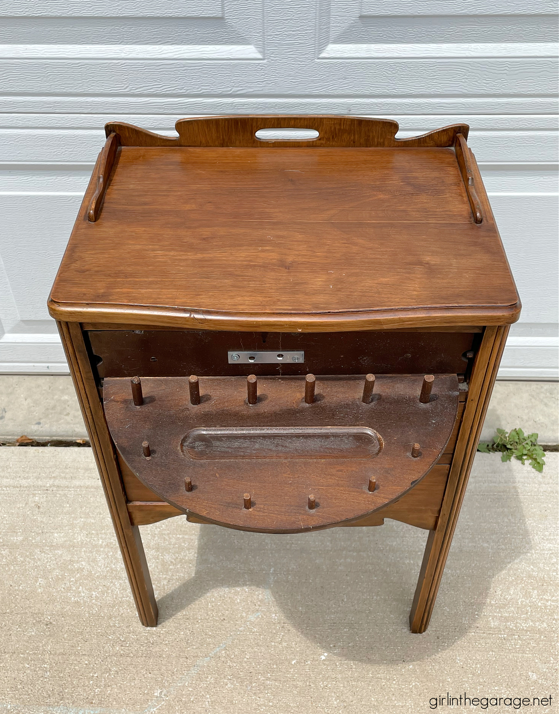 Before: How to paint a vintage nightstand white and add charming decoupage poster board on the drawers. By Girl in the Garage