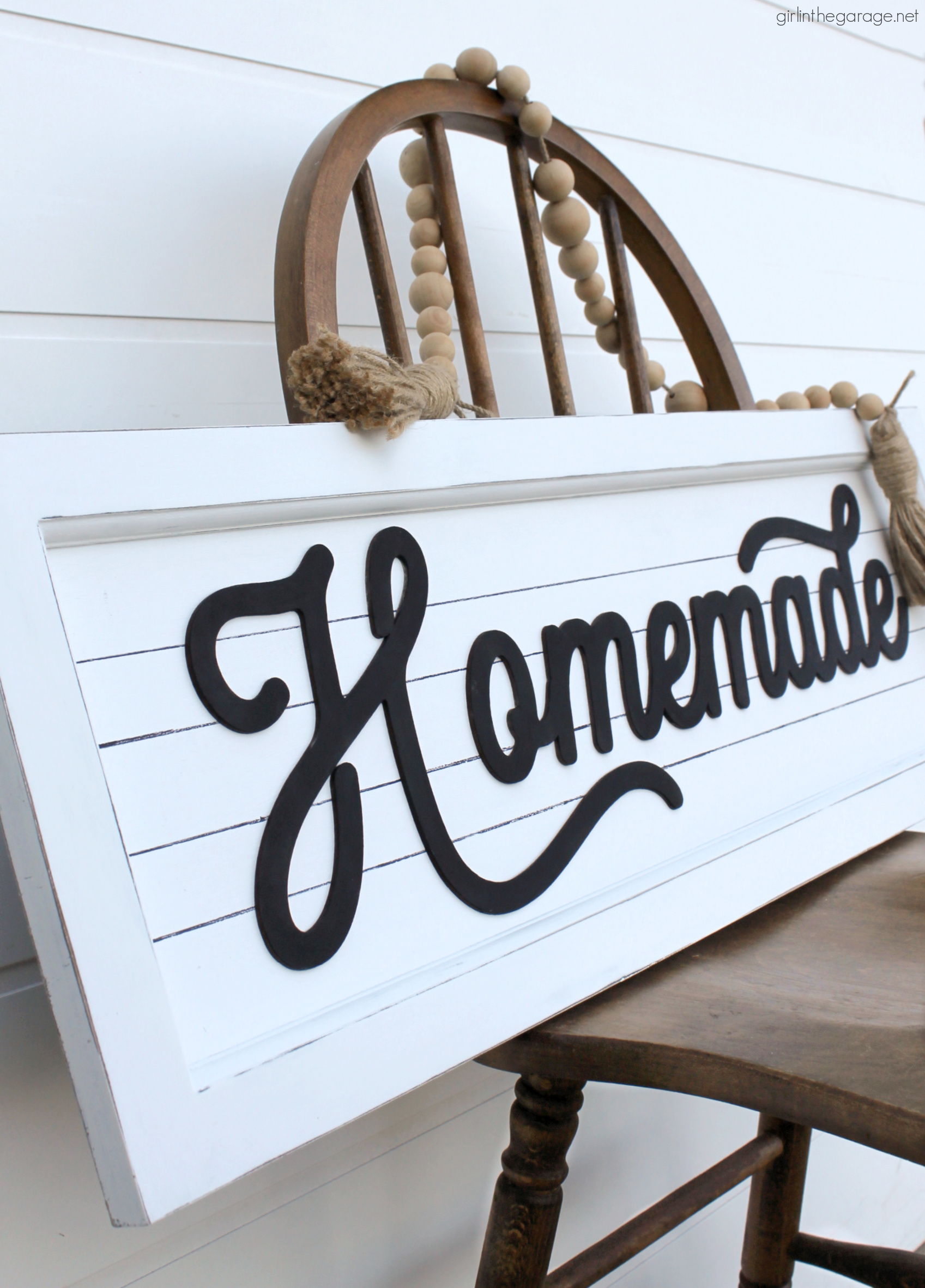 How to transform and repurpose old Goodwill art into a beautiful farmhouse-style sign for your home. Easy home decor ideas by Girl in the Garage