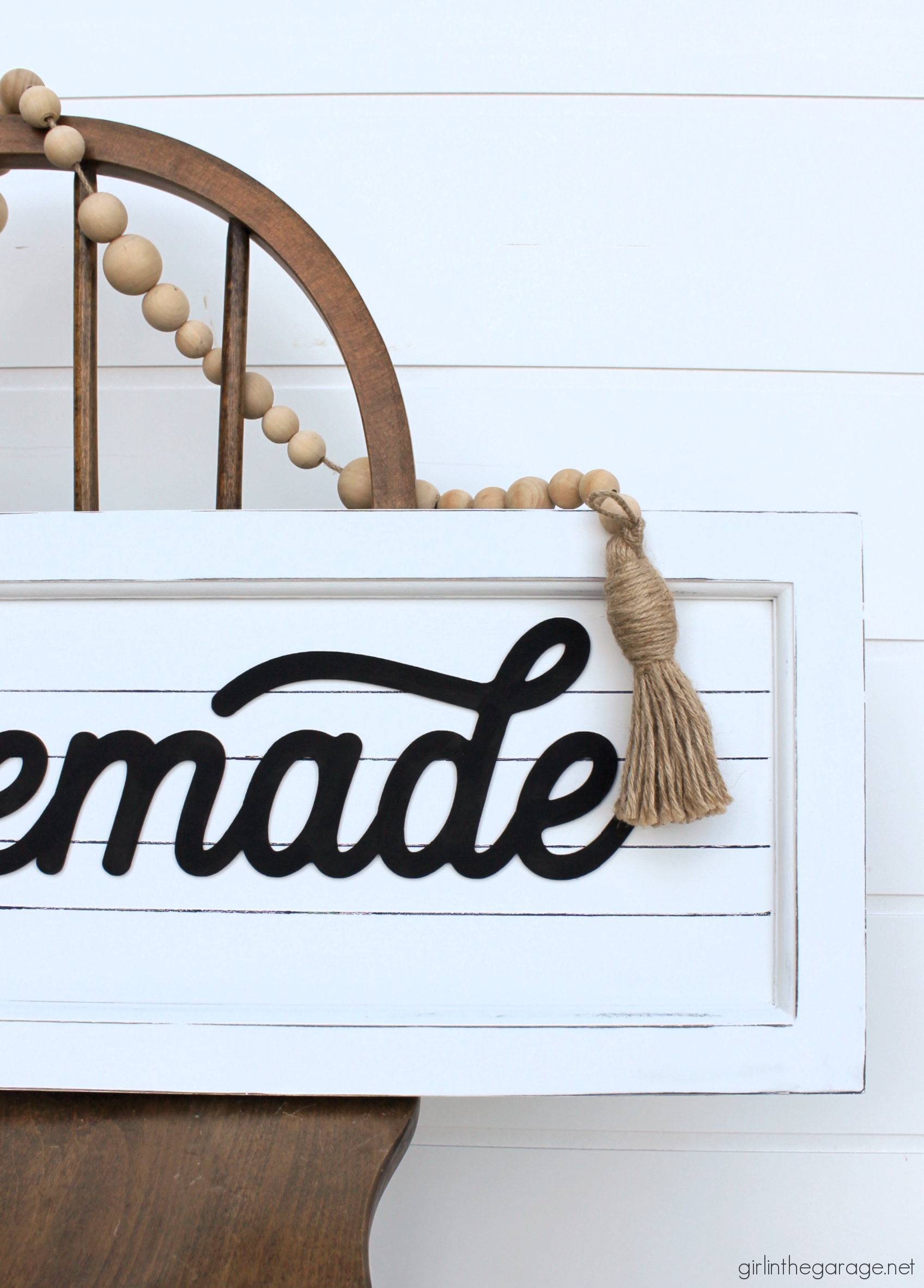 How to transform and repurpose old Goodwill art into a beautiful farmhouse-style sign for your home. Easy home decor ideas by Girl in the Garage